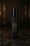 Andres Blanco Day One perfume bottle with gold logo on a dark background